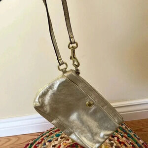 Coach gold metallic leather  pouch clutch wristlet
